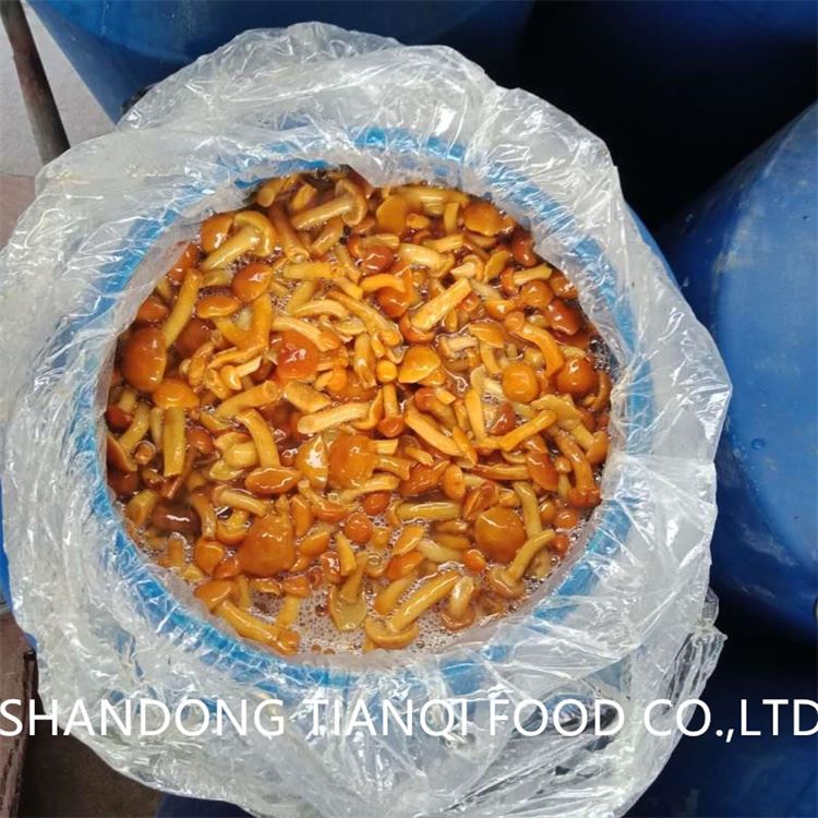 Brined nameko in plastic barrel