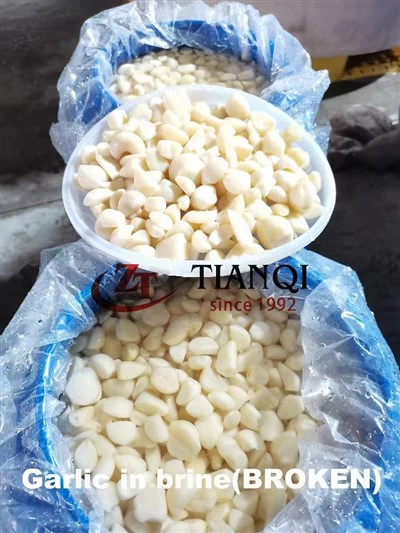 Зубчики чеснока в рассоле в барабане